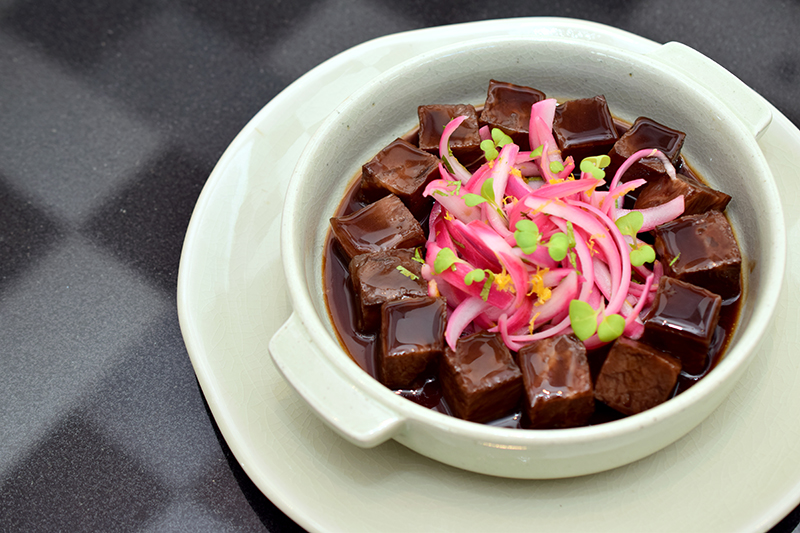 Bourguignonne beef cheeks with marinated onions and a coriander salad